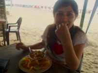 Enjoying some ceviche (with chifles, or fried plantain chips) on the beach
